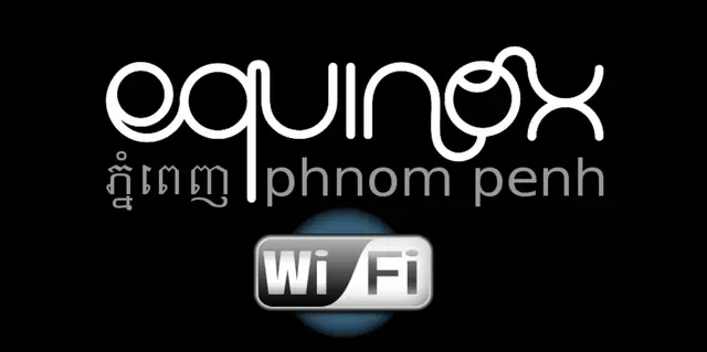 Sign saying "Equinox - Phnnom Penh -WiFi" for About Anthony Mrugacz website.