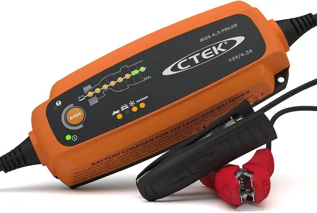 Orange colored CTEK  POLAR 12 Volt  Battery Charger which is endorsed by About Anthony Mrugacz 100%.